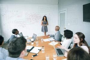 BUsiness woman whiteboard meeting