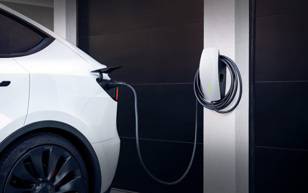 Tesla gen 3 wall connecter charging a telsa ev car