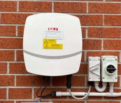SAJ 5kW r5 solar inverter installed on brick wall