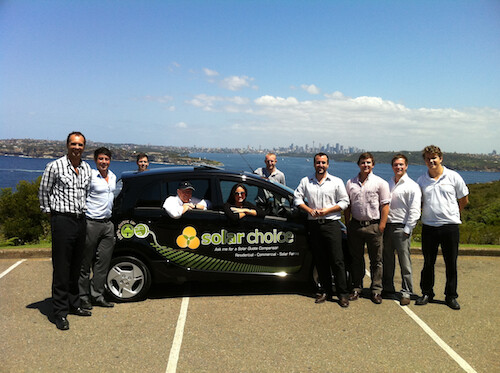 The Solar Choice team around the new i MiEV electric vehicle