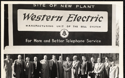 Western Electric billboard and staff