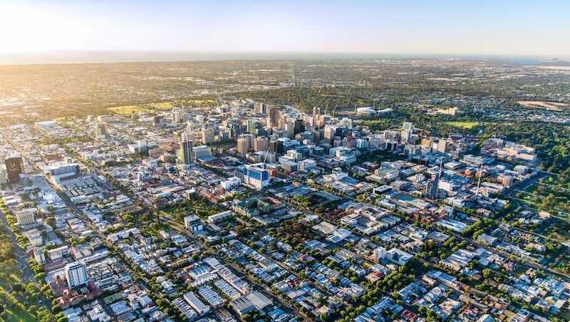 Solar panels Adelaide installation and panoramic view of the city