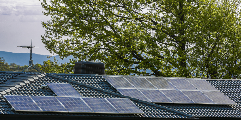 View of rooftop solar power panels for clean, free and renewable energy supply in Australian homes