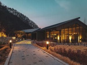 building with the lights on at night